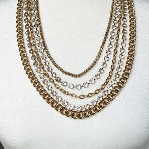 Cascading 5 strand Gold tone and rhinestone tennis style necklace with chains